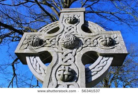 stock-photo-gravestone-cross-in-ireland-with-a-celtic-knot-design-56341537.jpg